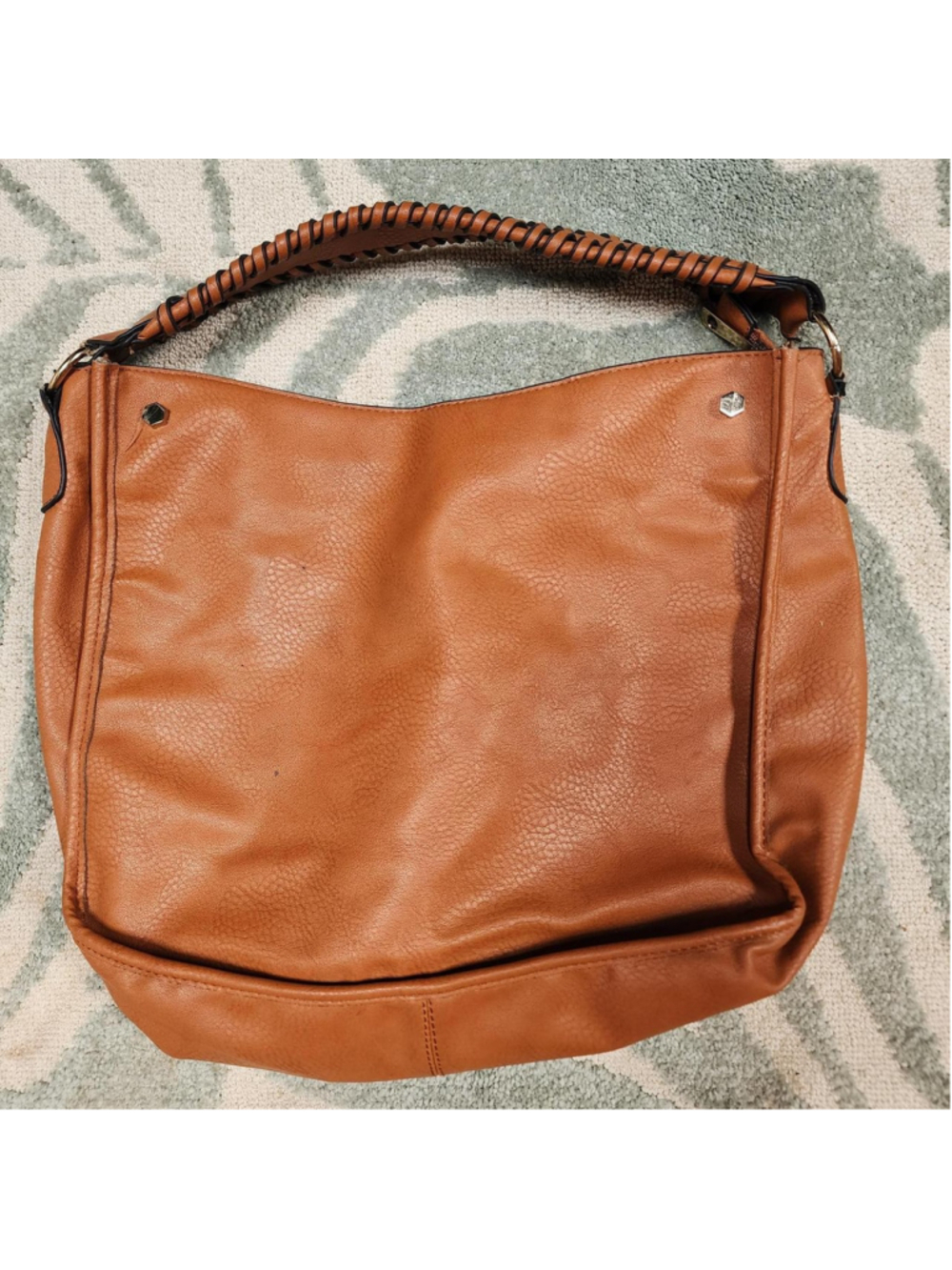 Tan leather hobo bag with pebbled texture #hobobag #leather